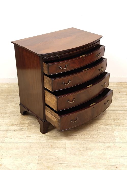 DIMINUTIVE ANTIQUE EDWARDIAN FLAME MAHOGANY BOW FRONT CHEST OF DRAWERS - ADDITIONAL PHOTO 1