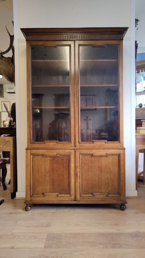early 20th century solid oak geometric adjustable bookcase on cupboard - CATEGORY: ANTIQUE BOOKCASES - DATED 1930