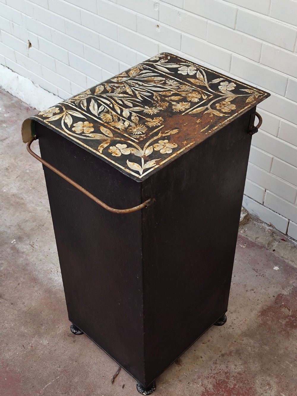 A hand-painted black and green metal toleware washstand with an open lid revealing a circular mirror and a fitted ceramic washbasin. View XIV