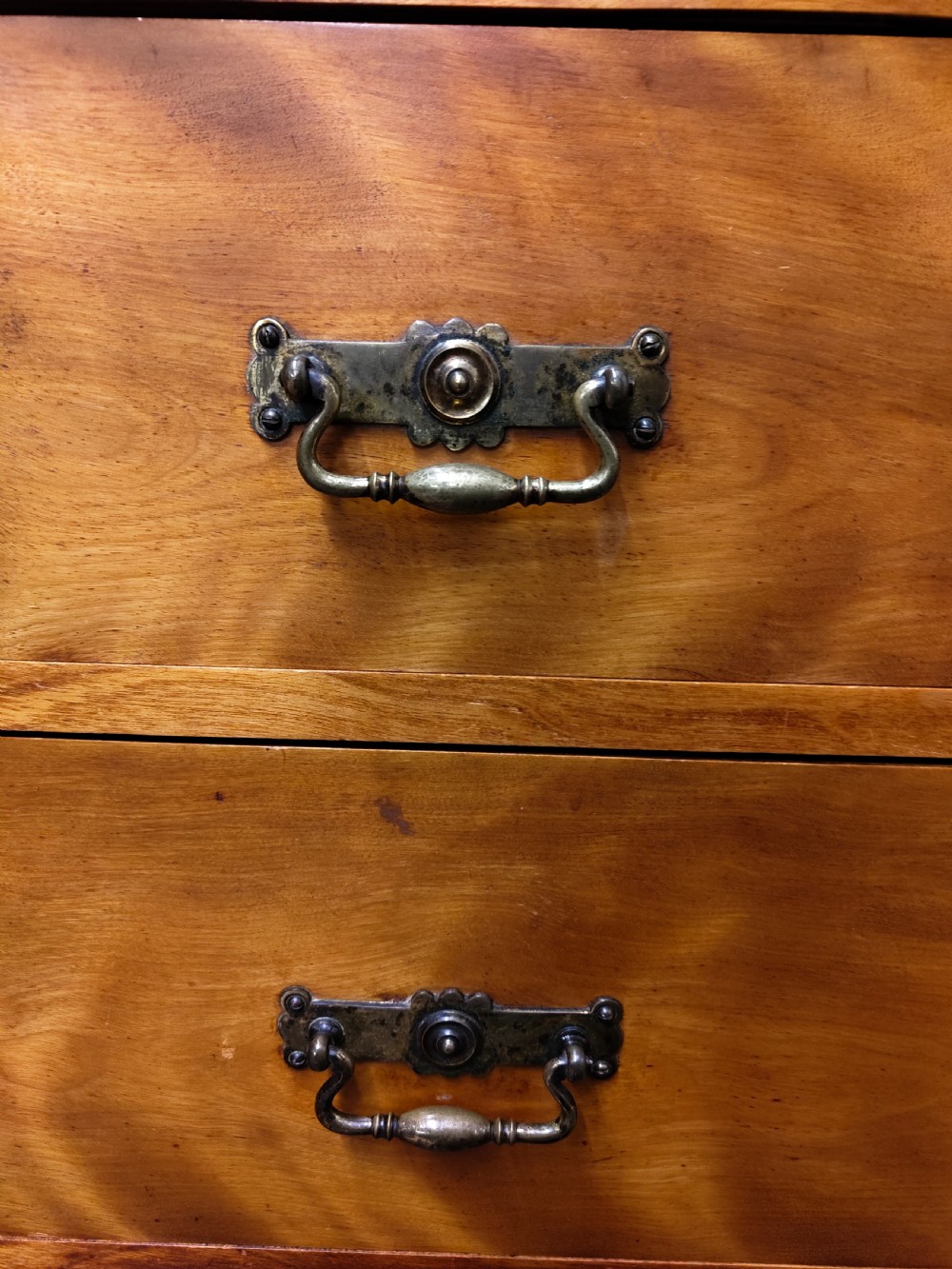 Victorian satin birch corner compactum wardrobe featuring arched panelled doors, brass hardware, and a integrated chest of drawers. View XXII