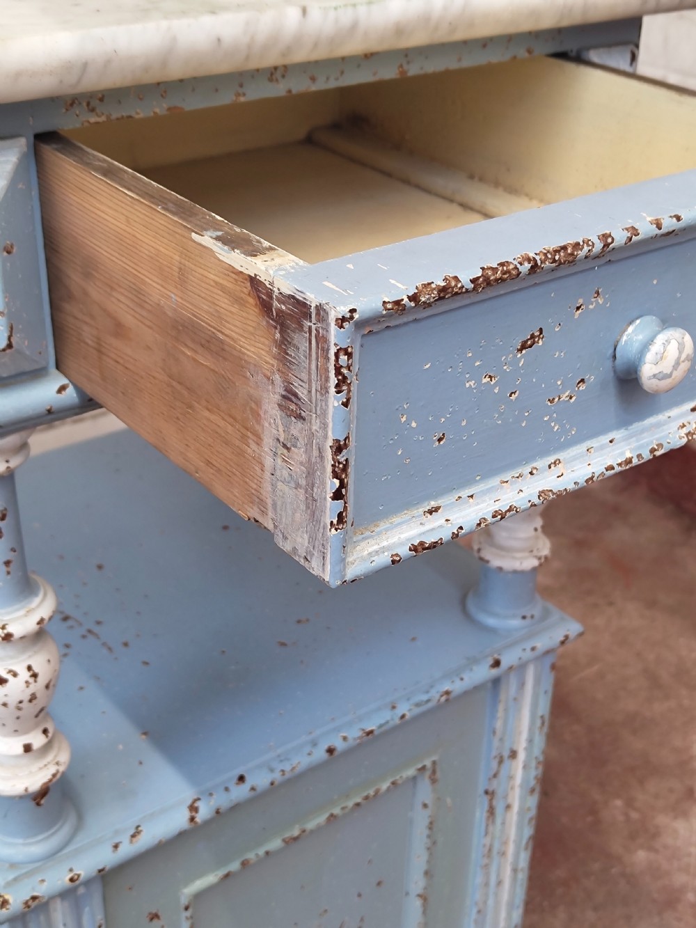A pair of light blue painted French bedside tables featuring marble tops, single drawers, turned spindle columns, and bottom cupboards. View III