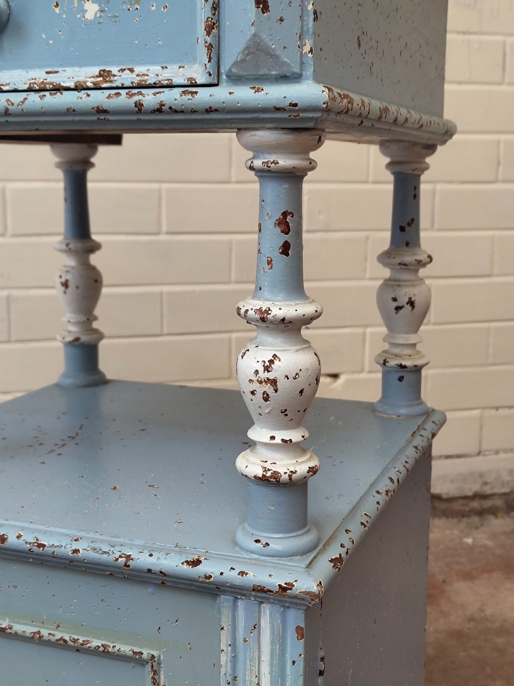 A pair of light blue painted French bedside tables featuring marble tops, single drawers, turned spindle columns, and bottom cupboards. View XIV