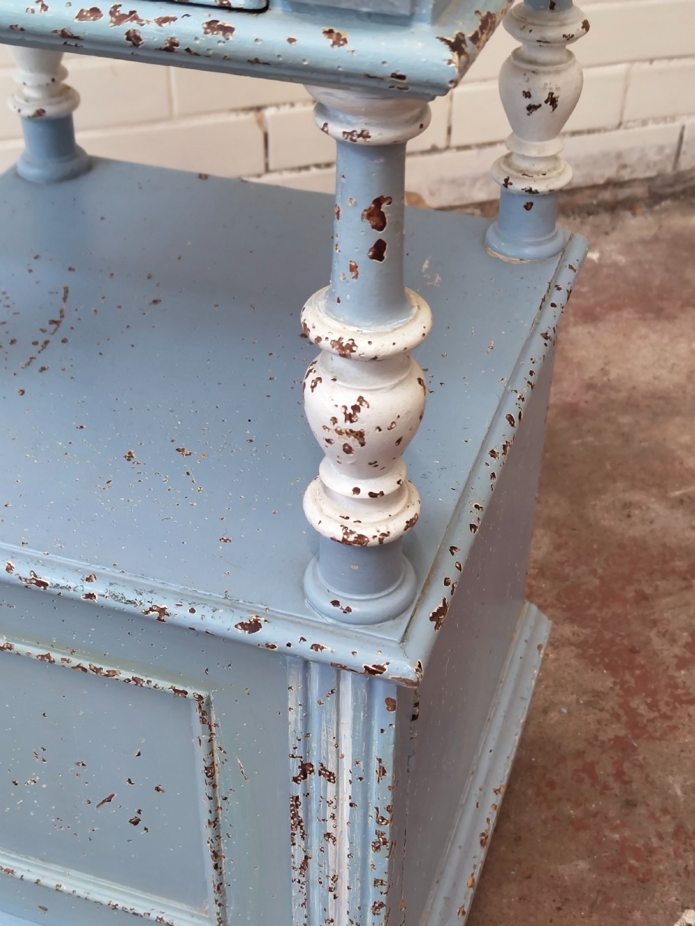 A pair of light blue painted French bedside tables featuring marble tops, single drawers, turned spindle columns, and bottom cupboards. View XV