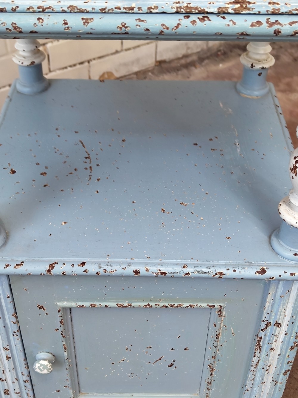 A pair of light blue painted French bedside tables featuring marble tops, single drawers, turned spindle columns, and bottom cupboards. View XVIII