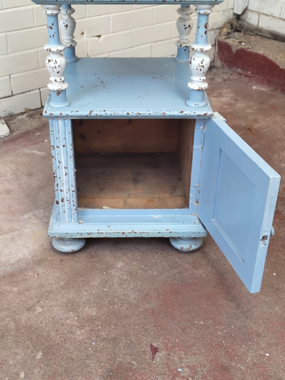 A pair of light blue painted French bedside tables featuring marble tops, single drawers, turned spindle columns, and bottom cupboards. View XIX