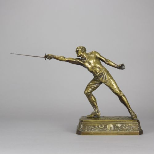 fig 1. A bronze sculpture depicting a shirtless male fencer in a lunge position with an extended blade, set upon a decorated bronze base.