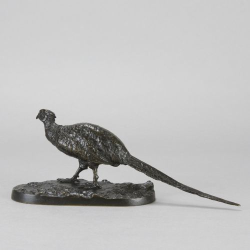 fig 5. A dark patinated bronze sculpture depicting a pheasant standing on an integral naturalist ground base.
