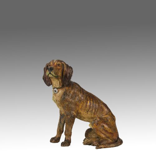 EARLY 20TH CENTURY COLDPAINTED BRONZE ENTITLED SEATED HOUND BY FRANZ BERGMAN