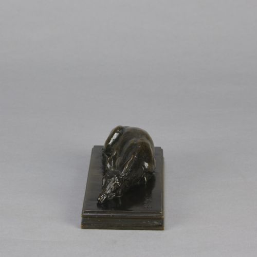 fig 3. A dark brown patinated bronze sculpture depicting a reclining doe resting on a rectangular bronze base signed Barye.