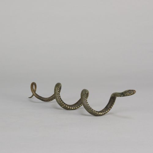 fig 5. An early 20th-century Viennese cold-painted bronze figure depicting a coiled snake with realistic scale detail.