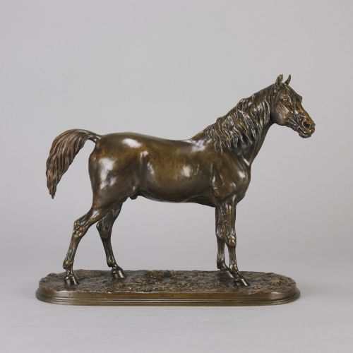 fig 1. A mid-nineteenth-century patinated bronze sculpture depicting an Arabian stallion standing on a naturalistic base.