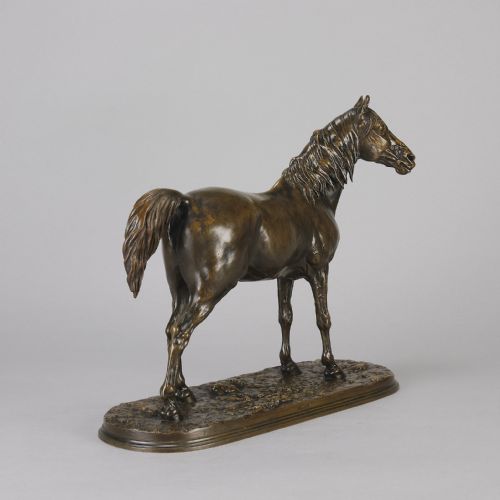 fig 3. A mid-nineteenth-century patinated bronze sculpture depicting an Arabian stallion standing on a naturalistic base.