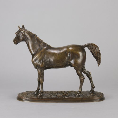 fig 4. A mid-nineteenth-century patinated bronze sculpture depicting an Arabian stallion standing on a naturalistic base.