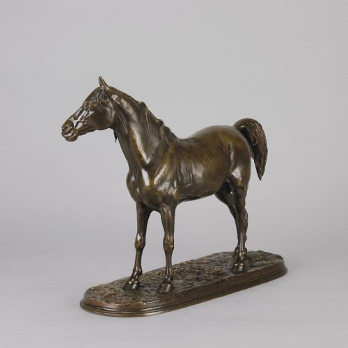 fig 5. A mid-nineteenth-century patinated bronze sculpture depicting an Arabian stallion standing on a naturalistic base.