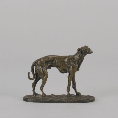 fig 2. A mid-19th-century French bronze sculpture depicting a standing greyhound with a dark patinated finish on an oval base.