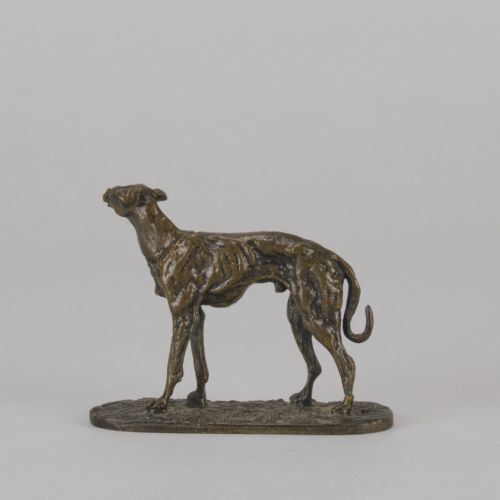 fig 3. A mid-19th-century French bronze sculpture depicting a standing greyhound with a dark patinated finish on an oval base.