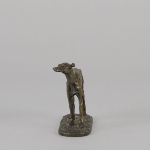 fig 4. A mid-19th-century French bronze sculpture depicting a standing greyhound with a dark patinated finish on an oval base.