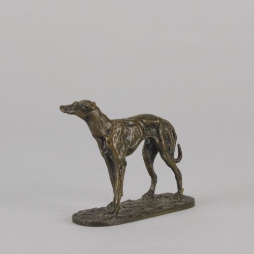 fig 6. A mid-19th-century French bronze sculpture depicting a standing greyhound with a dark patinated finish on an oval base.