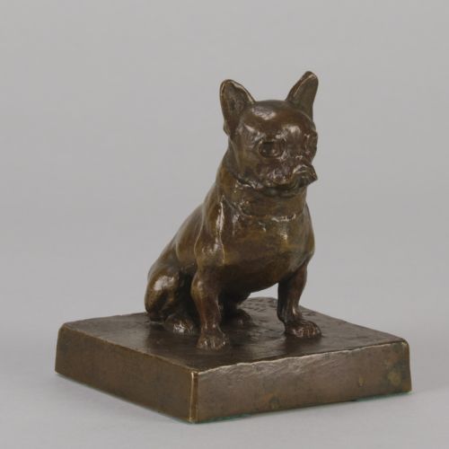 fig 2. A small patinated dark brown bronze sculpture of a seated French Bulldog positioned on a square metal plinth.