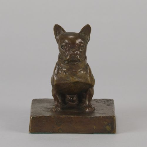 fig 3. A small patinated dark brown bronze sculpture of a seated French Bulldog positioned on a square metal plinth.