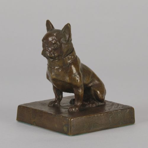fig 4. A small patinated dark brown bronze sculpture of a seated French Bulldog positioned on a square metal plinth.