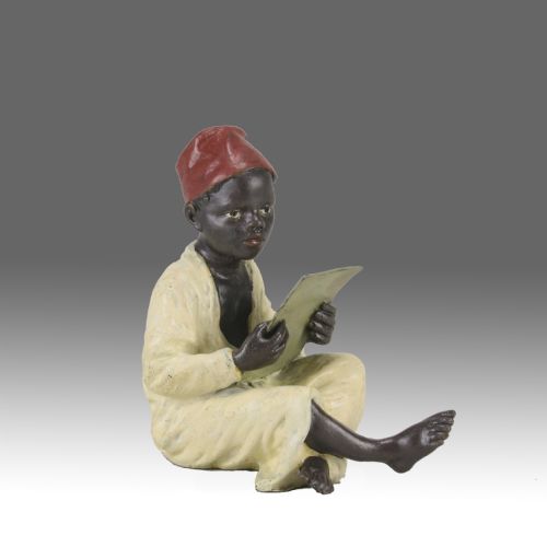 early 20th century coldpainted bronze entitled boy reading by franz bergman - CATEGORY: ANTIQUE SCULPTURES - DATED 1900