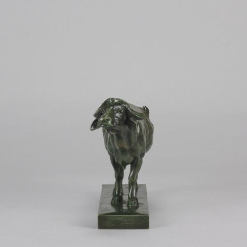 fig 1. A mid-19th-century green patinated bronze sculpture of a standing water buffalo on an integrated rectangular base.