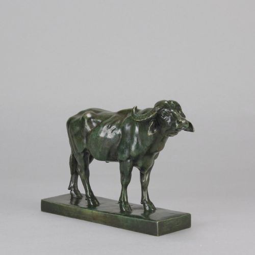 fig 4. A mid-19th-century green patinated bronze sculpture of a standing water buffalo on an integrated rectangular base.