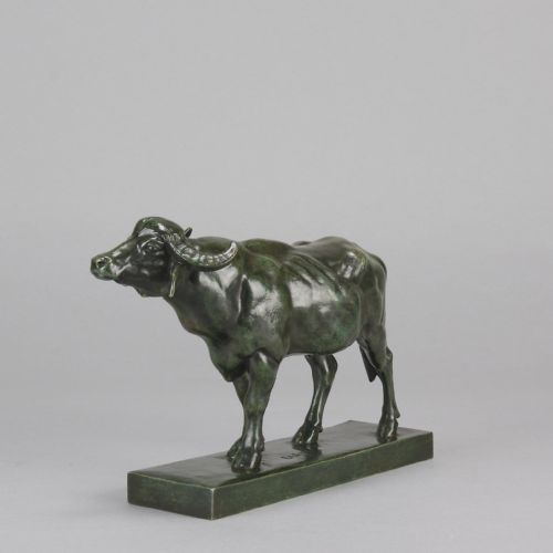fig 5. A mid-19th-century green patinated bronze sculpture of a standing water buffalo on an integrated rectangular base.
