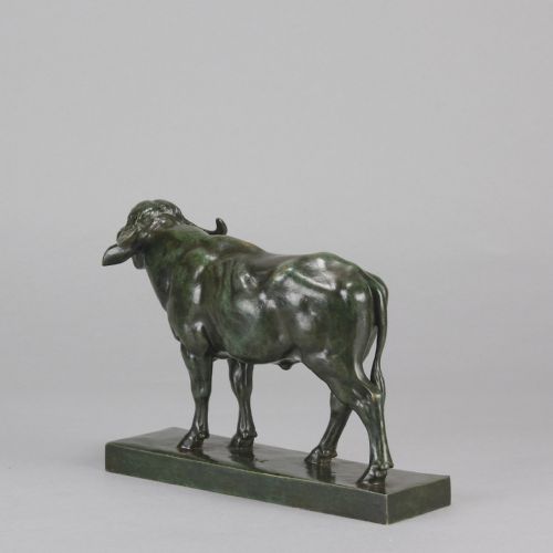 fig 6. A mid-19th-century green patinated bronze sculpture of a standing water buffalo on an integrated rectangular base.