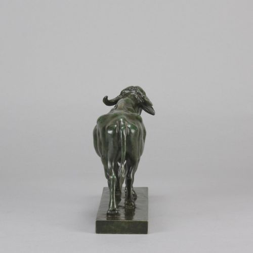 fig 7. A mid-19th-century green patinated bronze sculpture of a standing water buffalo on an integrated rectangular base.