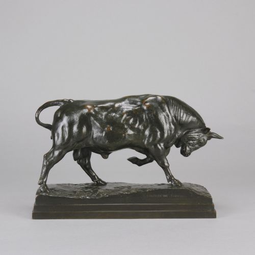 fig 5. A mid-19th-century dark patinated bronze sculpture of a standing bull with muscular details on an integral bronze base.