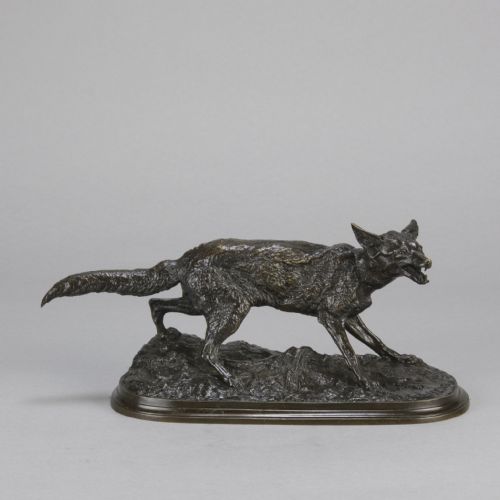 fig 1. A late nineteenth-century dark brown patinated bronze sculpture depicting a snarling fox prowling across a naturalistic base.