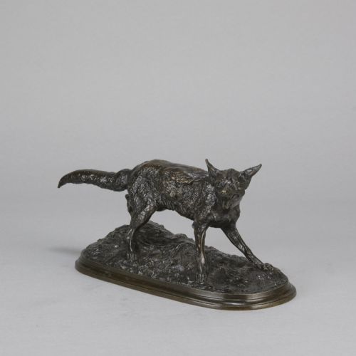 fig 2. A late nineteenth-century dark brown patinated bronze sculpture depicting a snarling fox prowling across a naturalistic base.