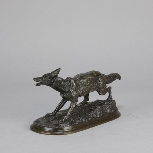 fig 4. A late nineteenth-century dark brown patinated bronze sculpture depicting a snarling fox prowling across a naturalistic base.