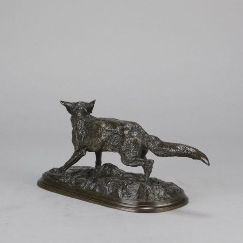fig 6. A late nineteenth-century dark brown patinated bronze sculpture depicting a snarling fox prowling across a naturalistic base.