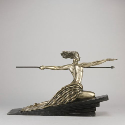 fig 5. An Art Deco silvered metal sculpture depicting a stylized female archer holding a spear, mounted on a stepped black base.