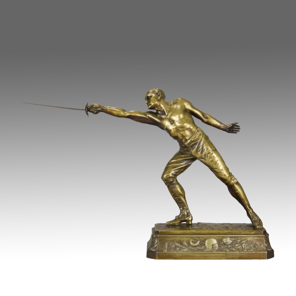 A bronze sculpture depicting a shirtless male fencer in a lunge position with an extended blade, set upon a decorated bronze base.
