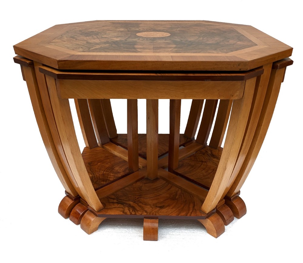 An octagonal 1930s Art Deco walnut nest of tables featuring quarter-matched burr walnut veneer top and four fitted triangular side tables. View VI
