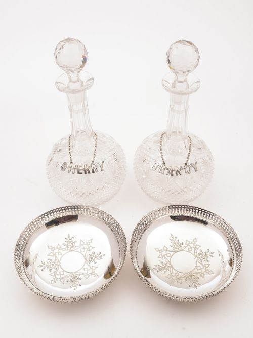 Pair of Cut Glass Decanters with Coasters, Circa 1890