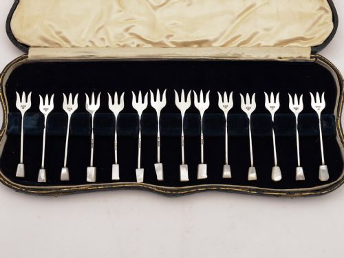Cased Matched Set of 14 Silver Hors D'oeuvres Forks, Sheffield