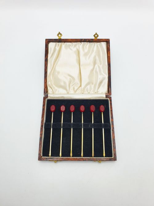 fig 1. Lovely Boxed Set of Six Antique Silver Gilt & Cherry Red Bakelite Cocktail Sticks – circa 1920