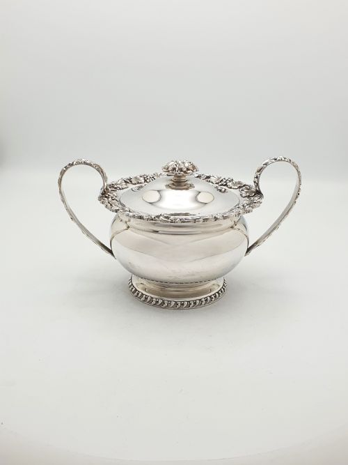 GORGEOUS ANTIQUE SILVERPLATED THREEPIECE TEA SET WITH ORNATE GRAPEVINE DETAILING CIRCA 1920 - ADDITIONAL PHOTO 4