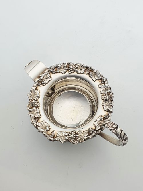 GORGEOUS ANTIQUE SILVERPLATED THREEPIECE TEA SET WITH ORNATE GRAPEVINE DETAILING CIRCA 1920 - ADDITIONAL PHOTO 10