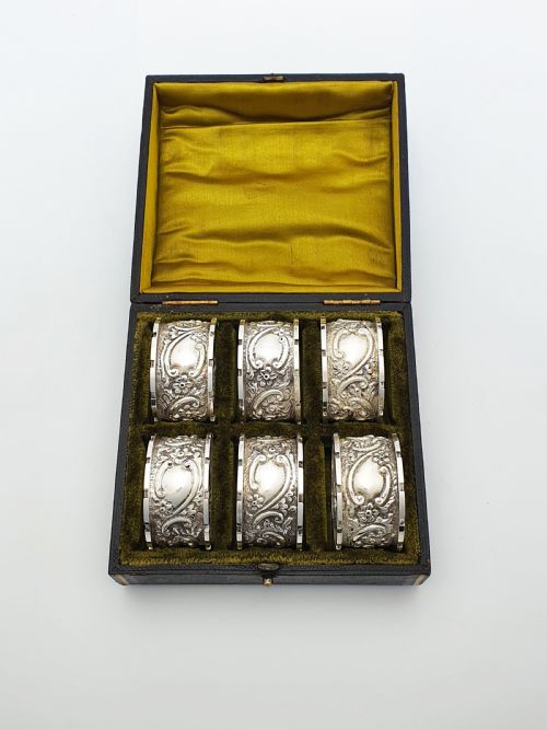 fig 1. Nice Boxed Set of 6 Ornate Antique Victorian Silver Plated Napkin Rings – circa 1890