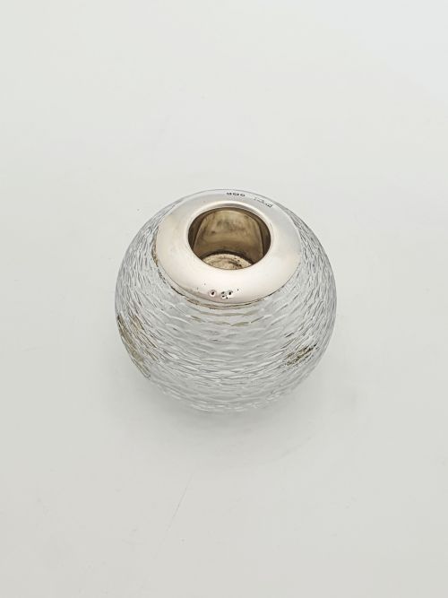 fig 1. An Edwardian spherical glass match striker featuring a textured rib outer surface and a hallmarked sterling silver collar at the top aperture.