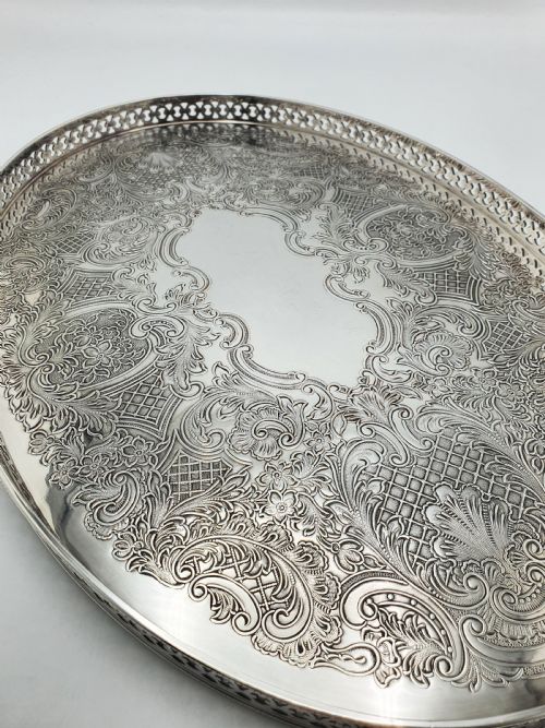 NICE SILVER PLATED OVAL SERVING TRAY WITH INTRICATE EMBOSSED SCROLLS CIRCA 1930 - ADDITIONAL PHOTO 1