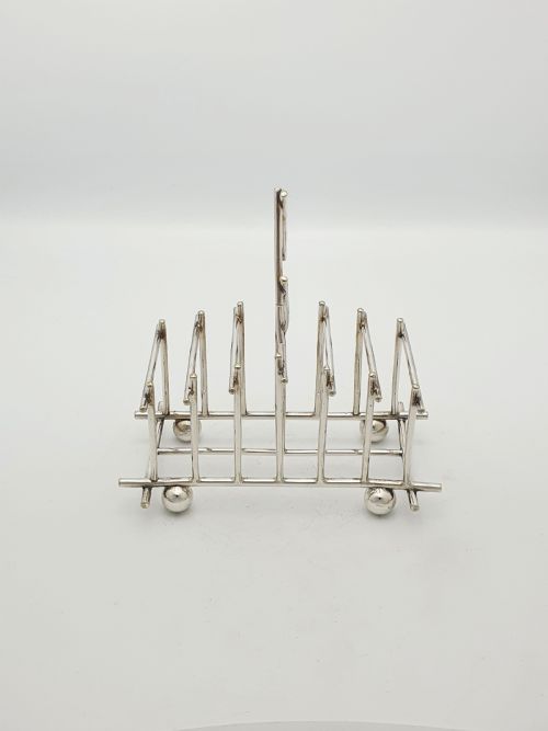 fig 1. Christopher Dresser Style Mappin & Webb Silver-Plated Toast Rack – circa 1890