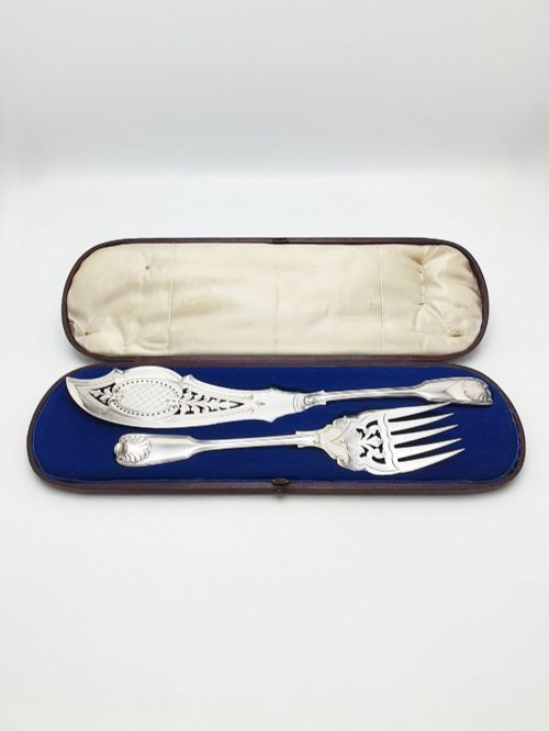 fig 1. An antique Victorian silver-plated fish serving set with an engraved knife and fork presented in a fitted satin and velvet lined case.