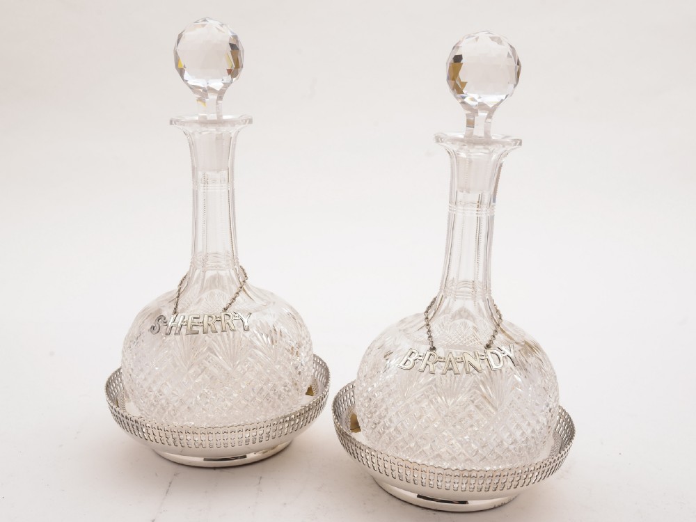 Pair of Cut Glass Decanters with Coasters, Circa 1890 View II